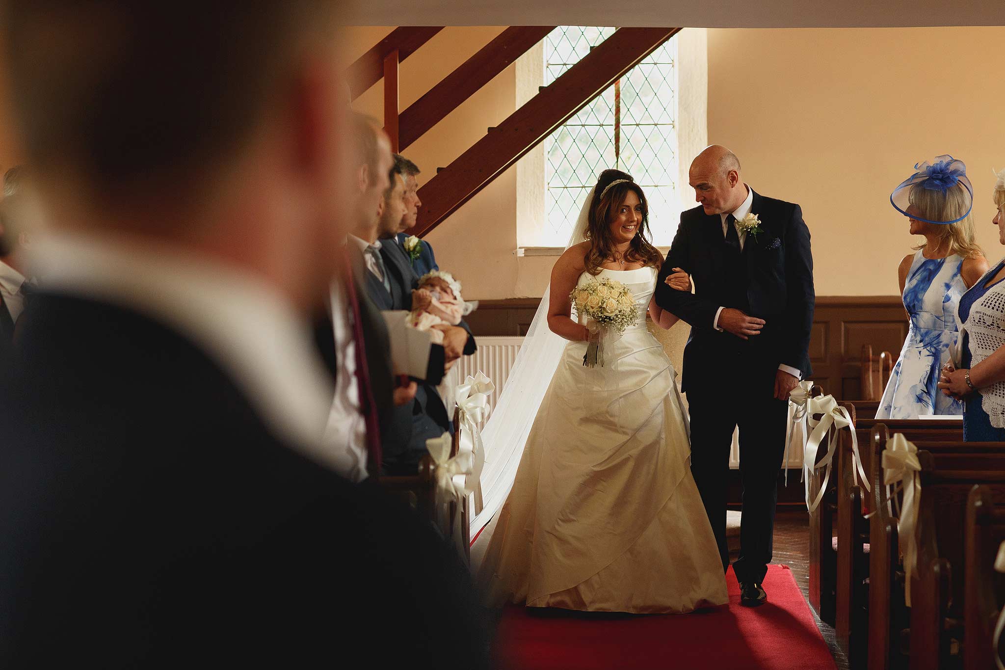 Dad walking bride down the aisle for wedding at the inn at whitewell