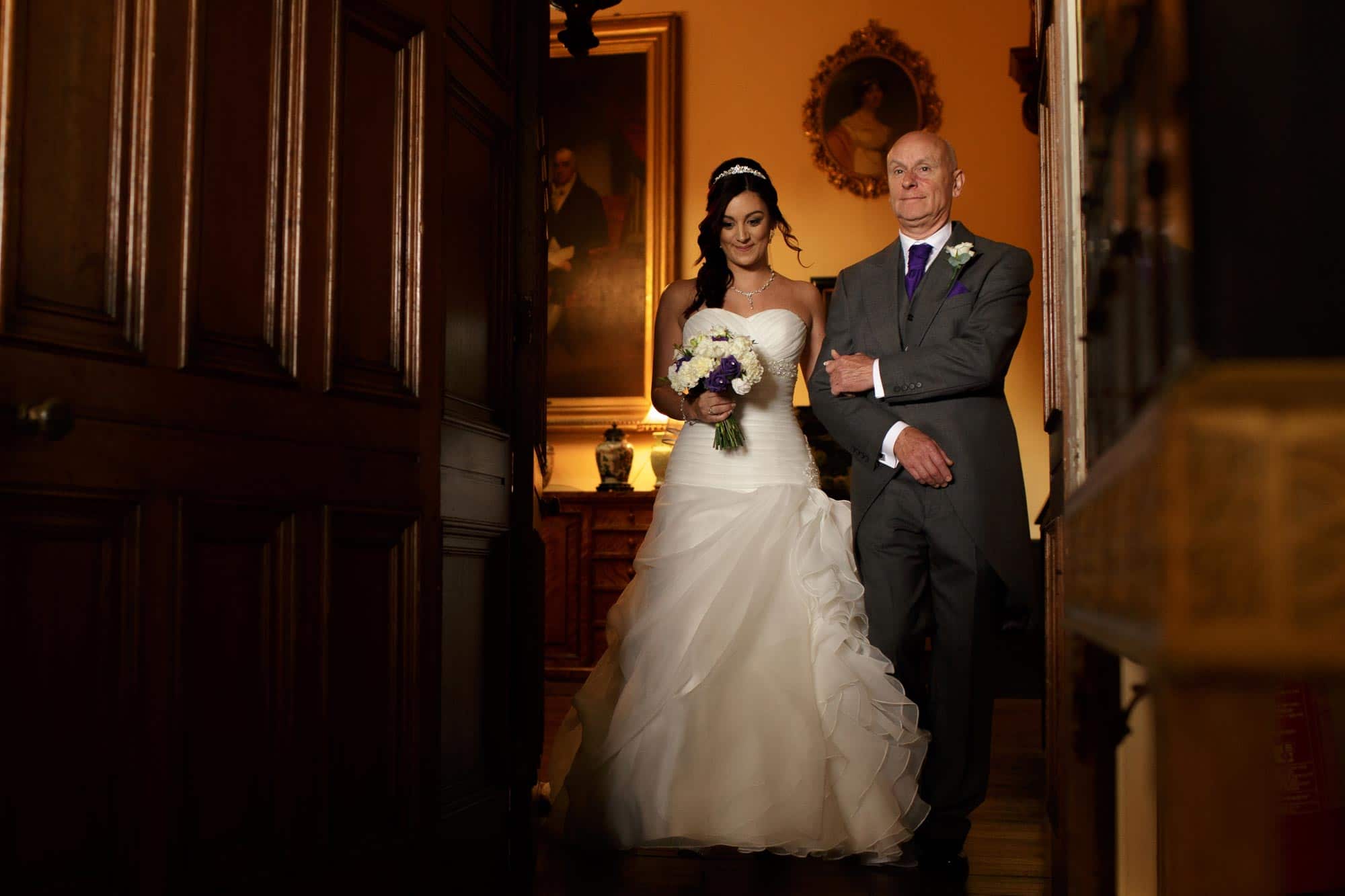 Father walking a bride down the aisle at Arley Hall wedding