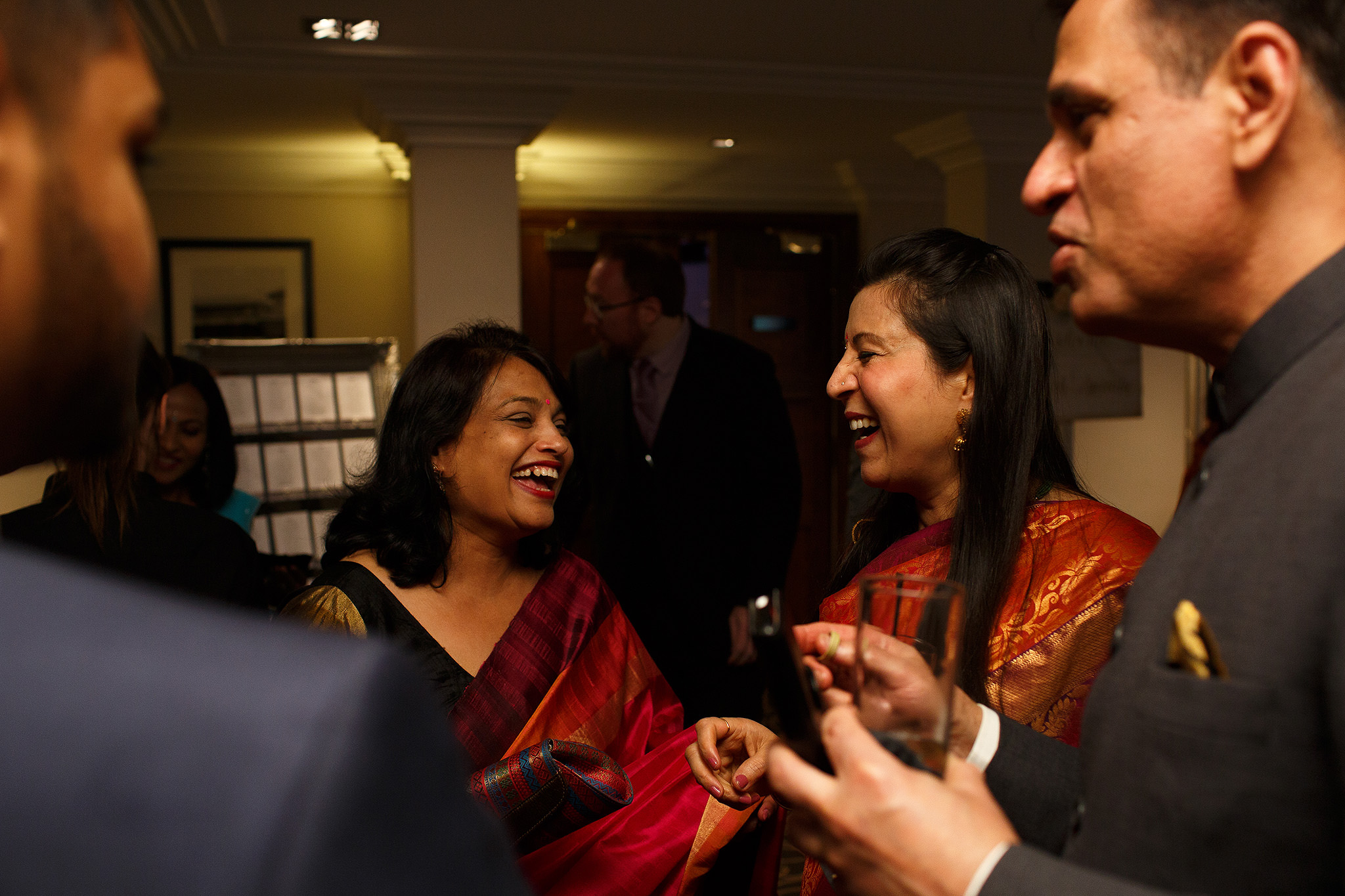 Guests laughing at Indian Wedding Reception