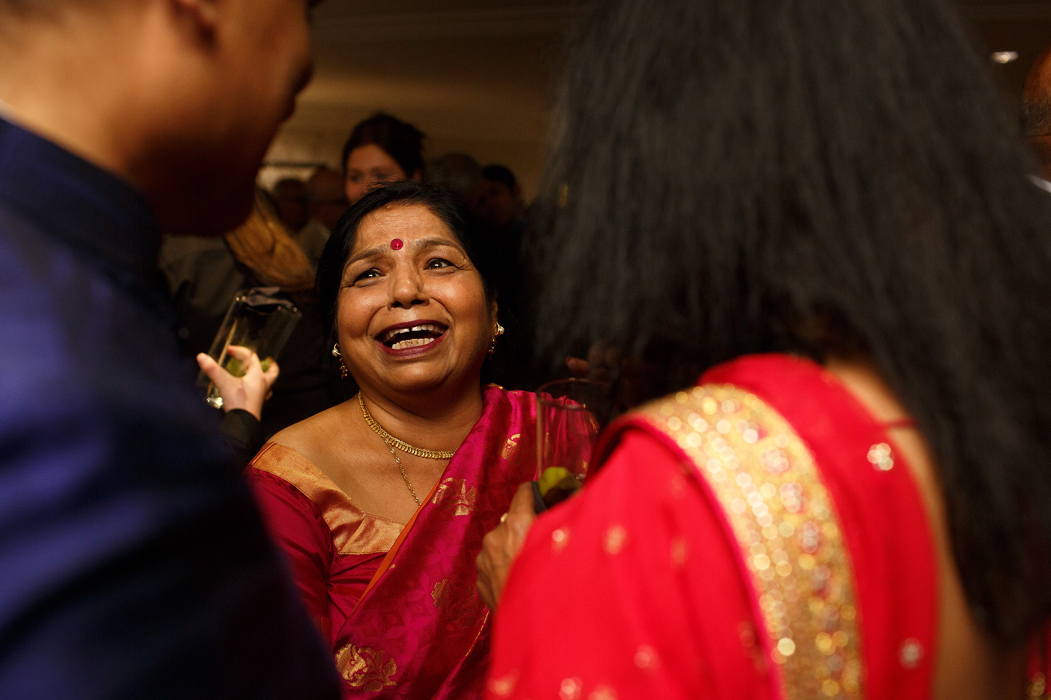 Guests laughing at Indian Wedding Reception