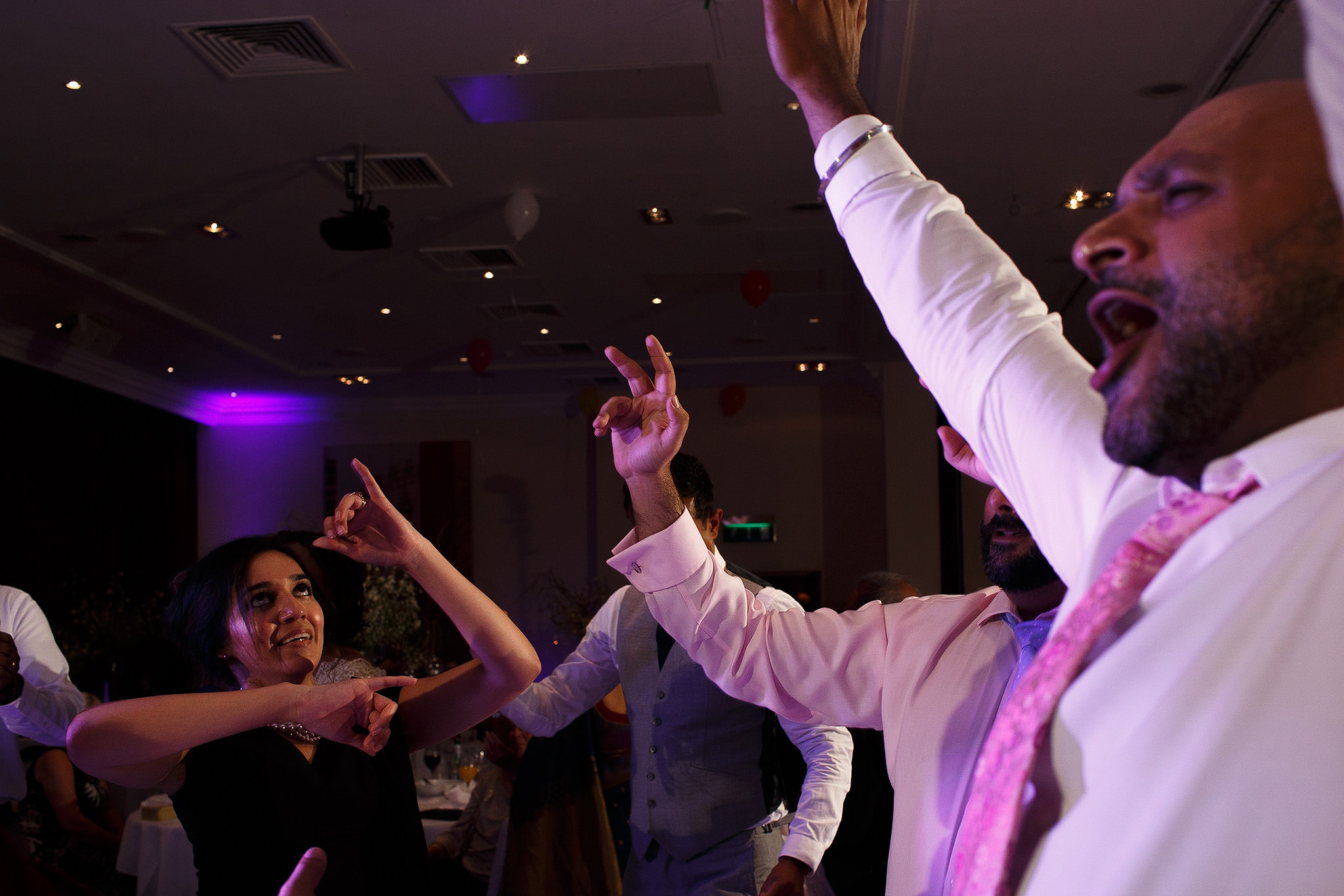Guests dancing at Indian wedding reception