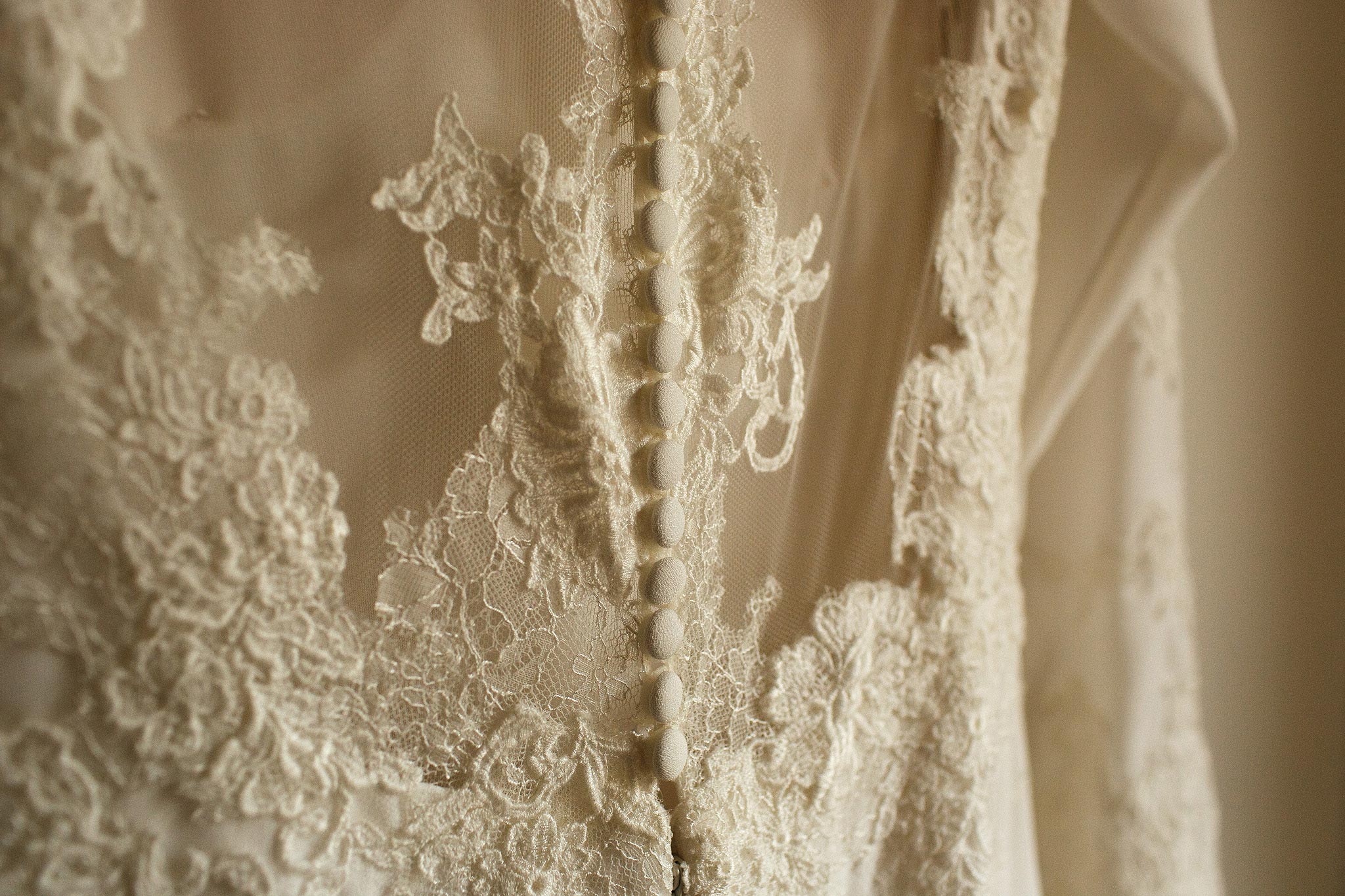 detailed picture of a brides wedding dress