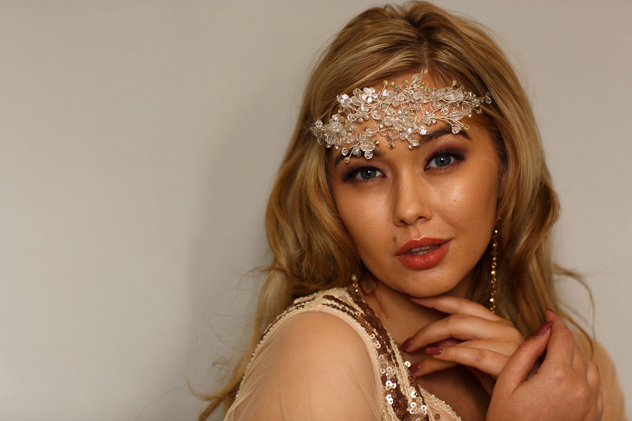 close up of bride wearing detailed headdress