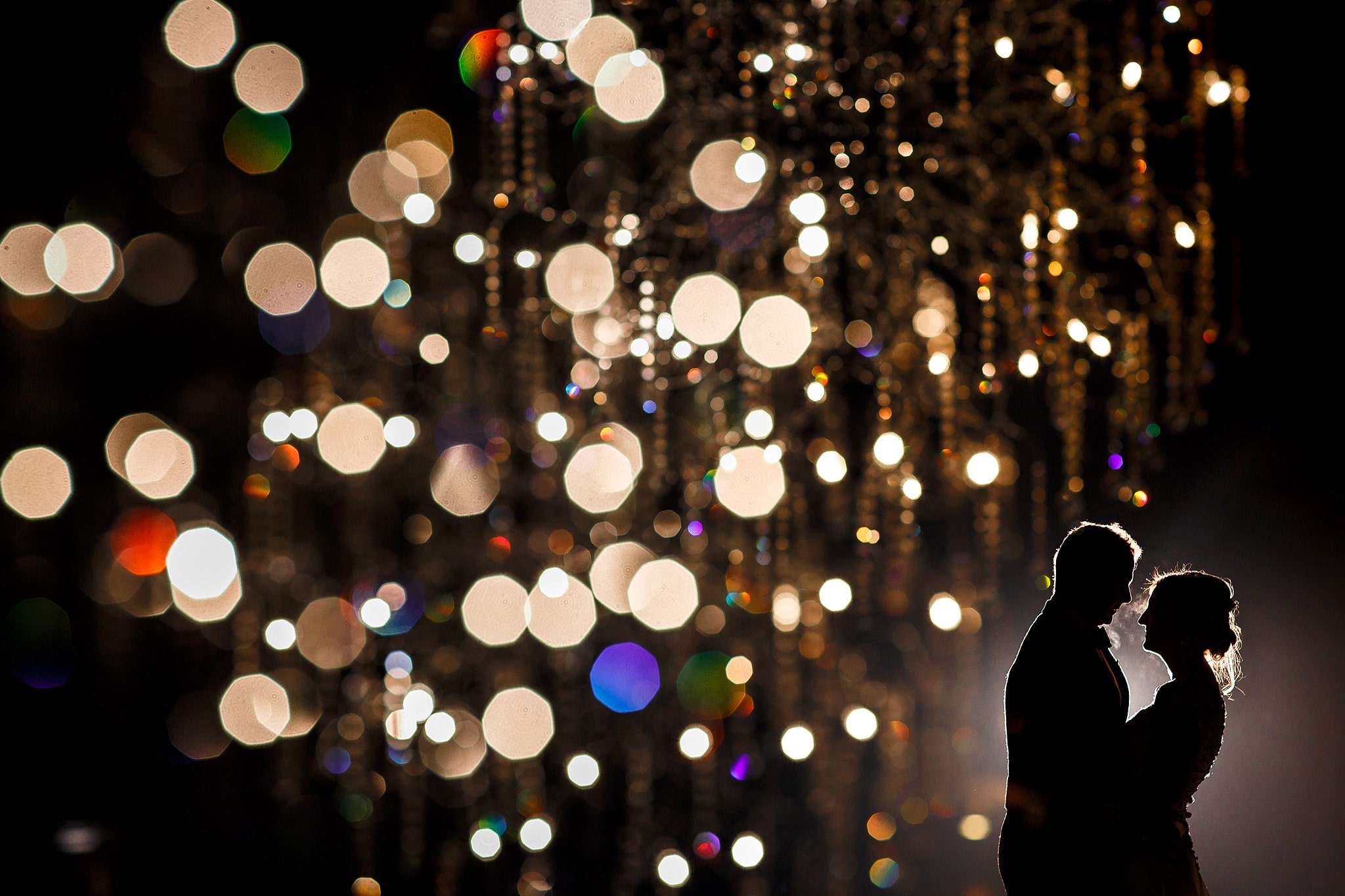 creative wedding portrait of bride and groom using lights at mitton hall